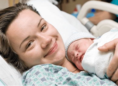 Mother holding her newborn