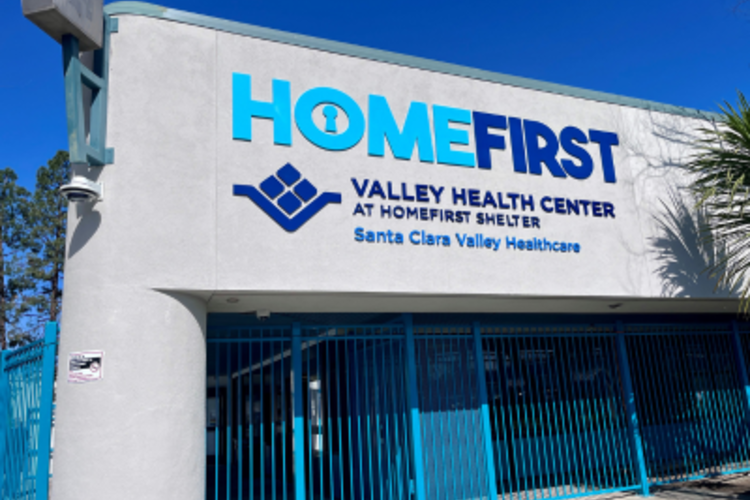 VHC HomeFirst sign on outside of shelter building